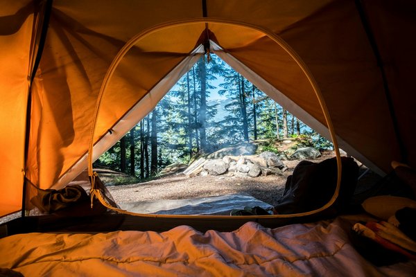How to plan a camping trip that includes visits to UK film and TV locations?